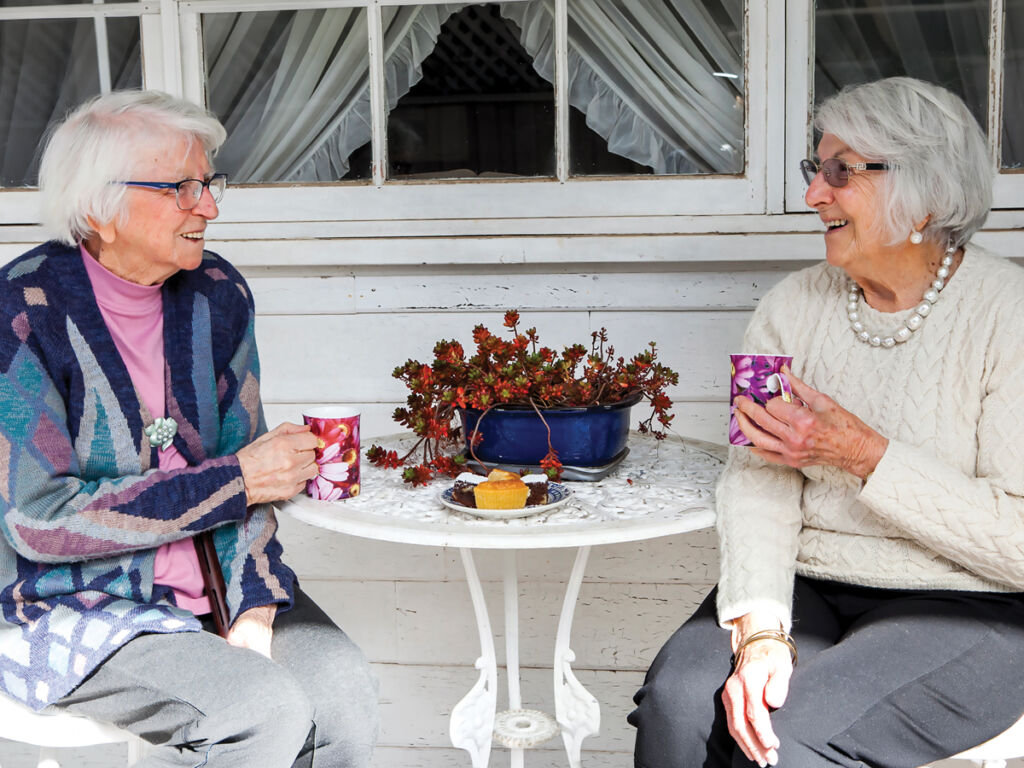 Neighbour-Day_Older-women-chatting-over-a-cuppa-outside